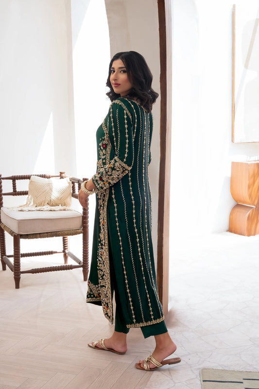 Silk emerald green zari wedding outfit with hand-made zari work on tussar silk