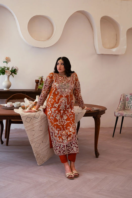 Orange organza wedding outfit with hand-made zari work