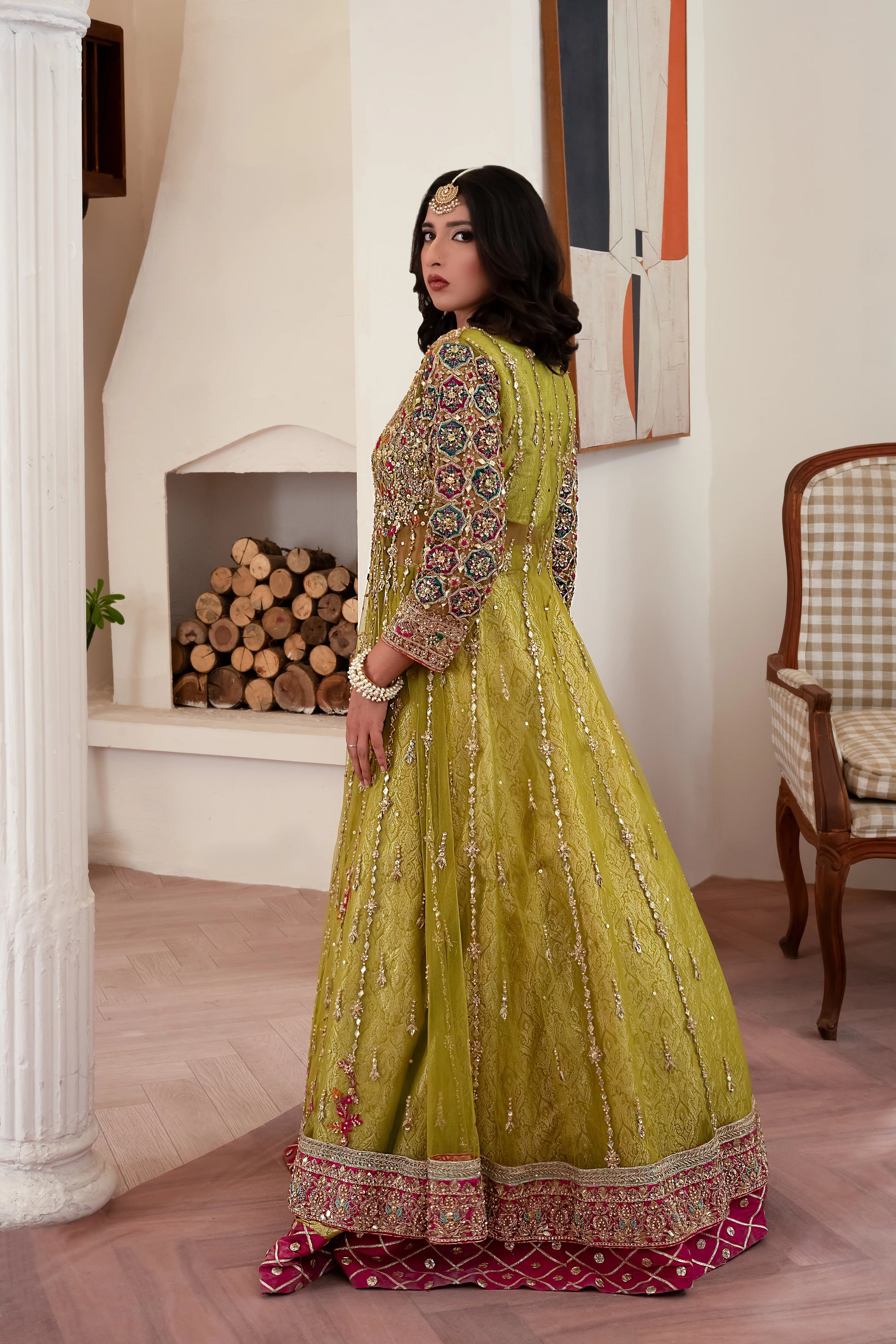 Soft green wedding lehenga choli with net gown and shimmering zari work