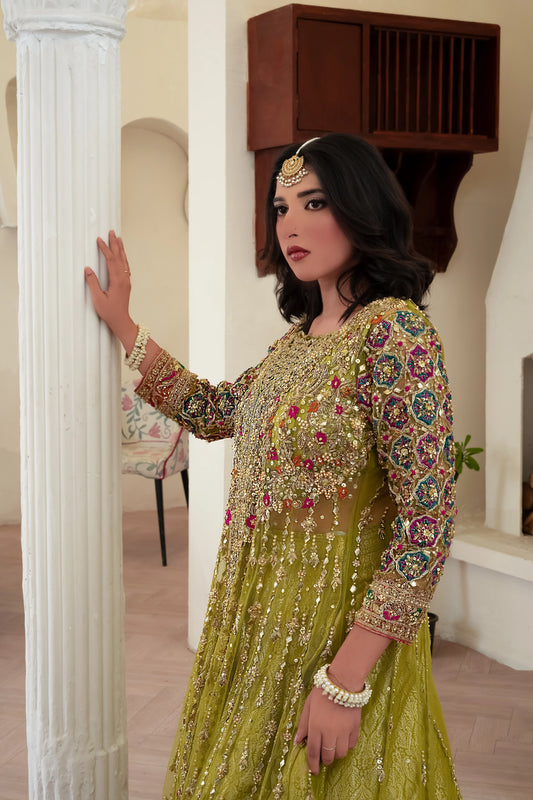 Soft green wedding lehenga choli with net gown and shimmering zari work