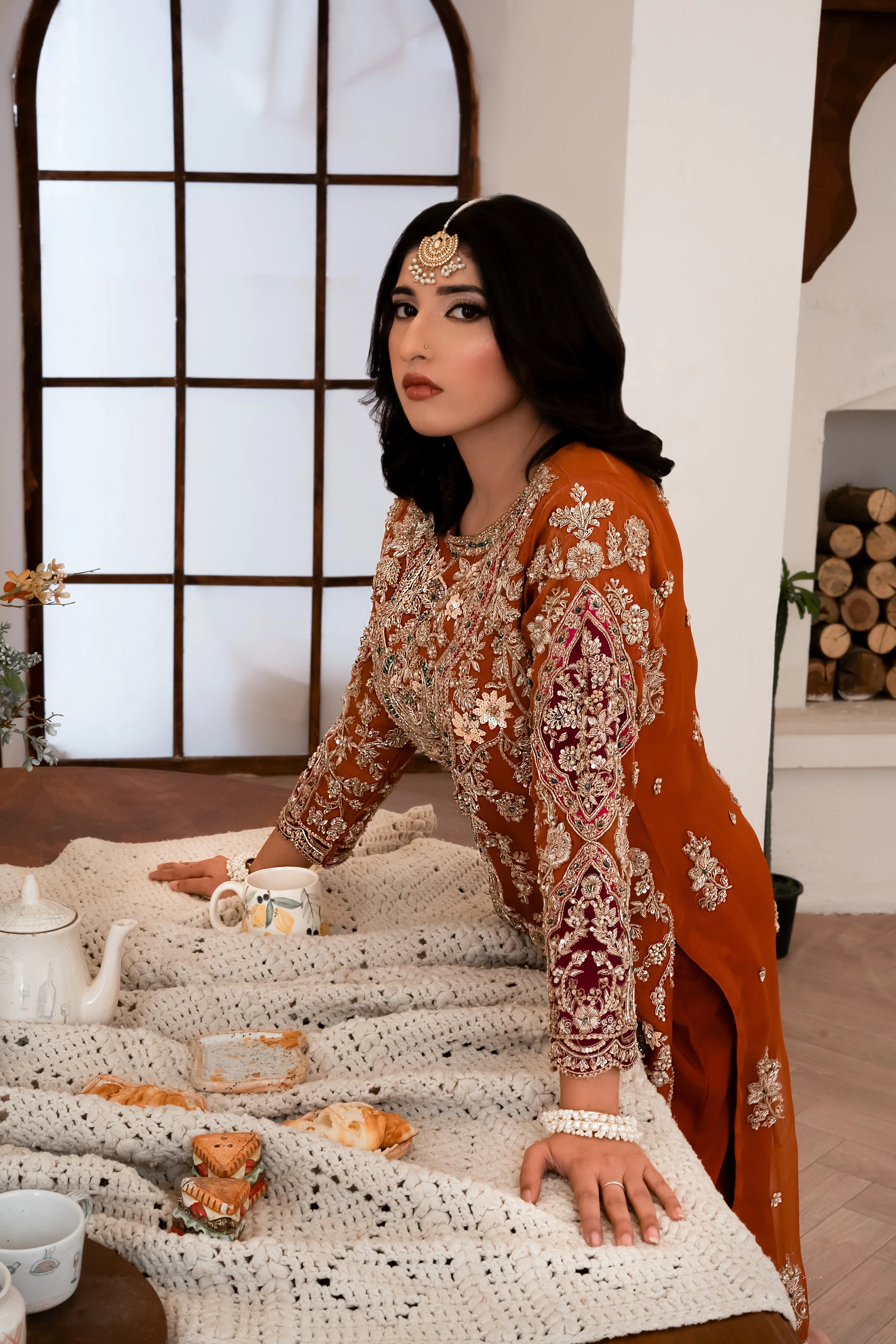 Orange organza wedding outfit with hand-made zari work