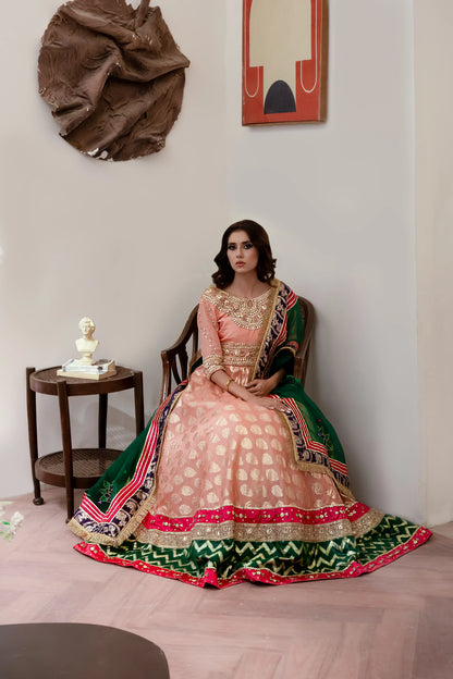 Soft peach lehenga choli wedding outfit with gota work and hand-painted dupatta