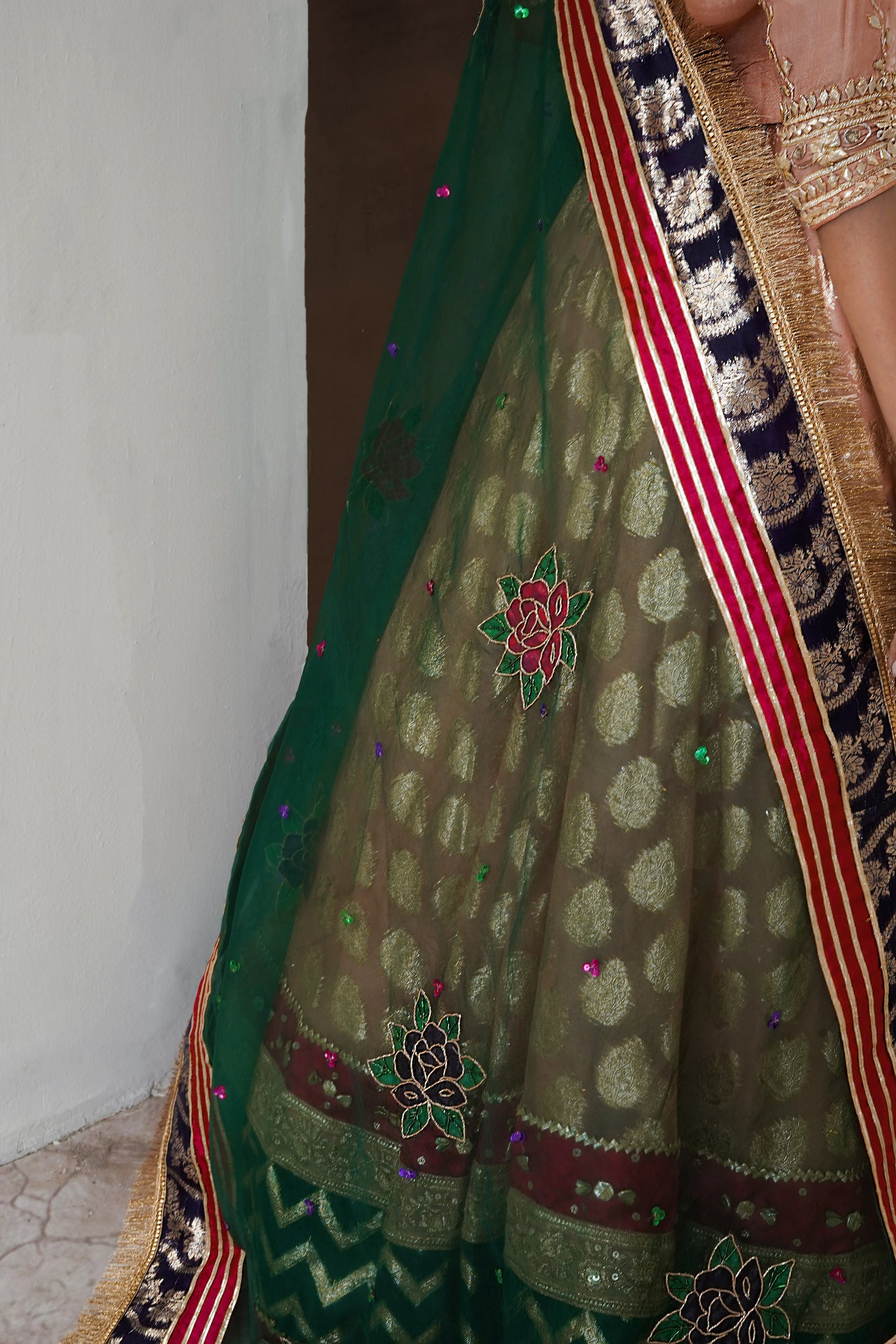 Soft peach lehenga choli wedding outfit with gota work and hand-painted dupatta