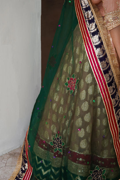 Soft peach lehenga choli wedding outfit with gota work and hand-painted dupatta