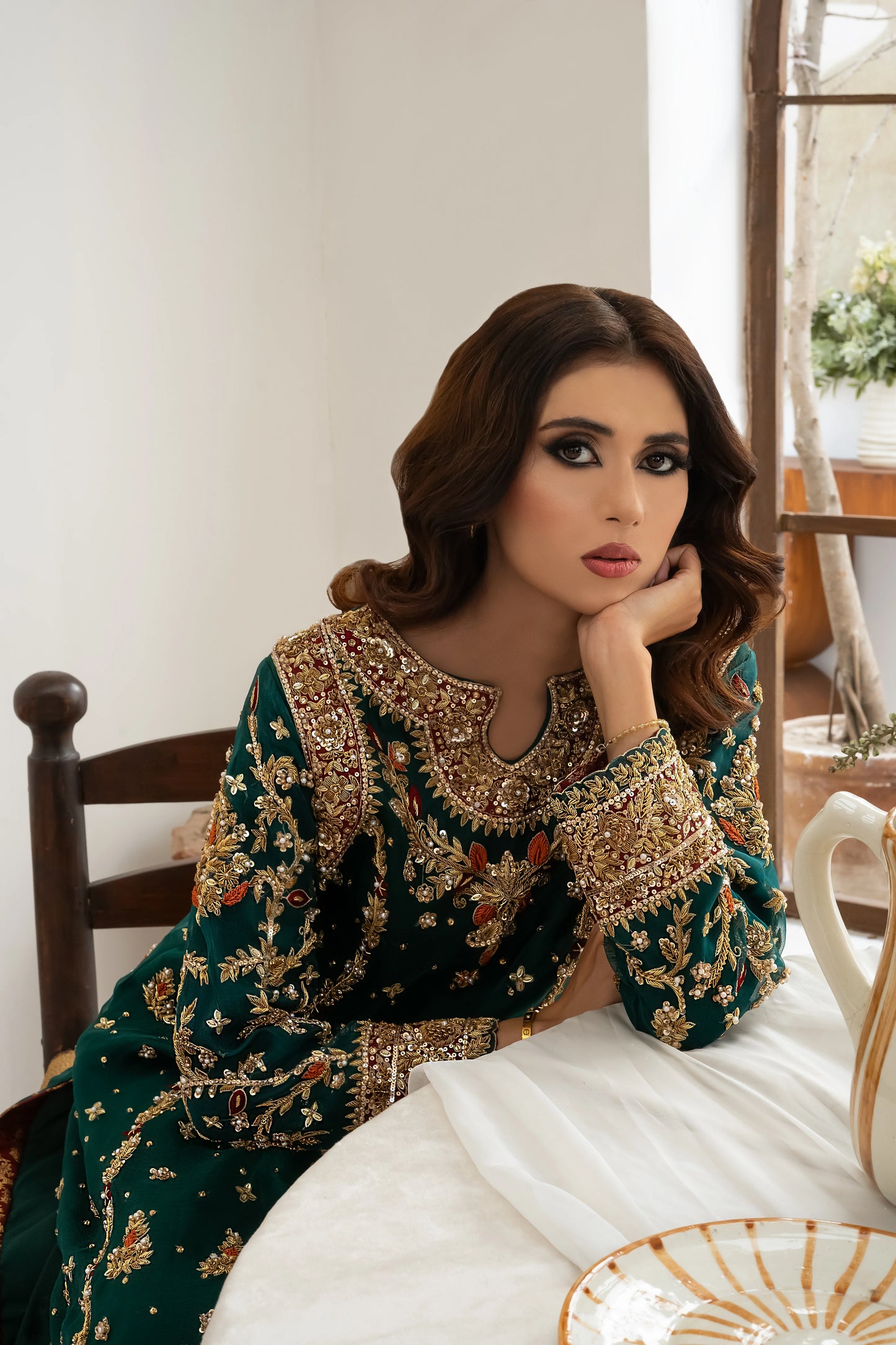 Dark green wedding outfit with hand-made zari work on net