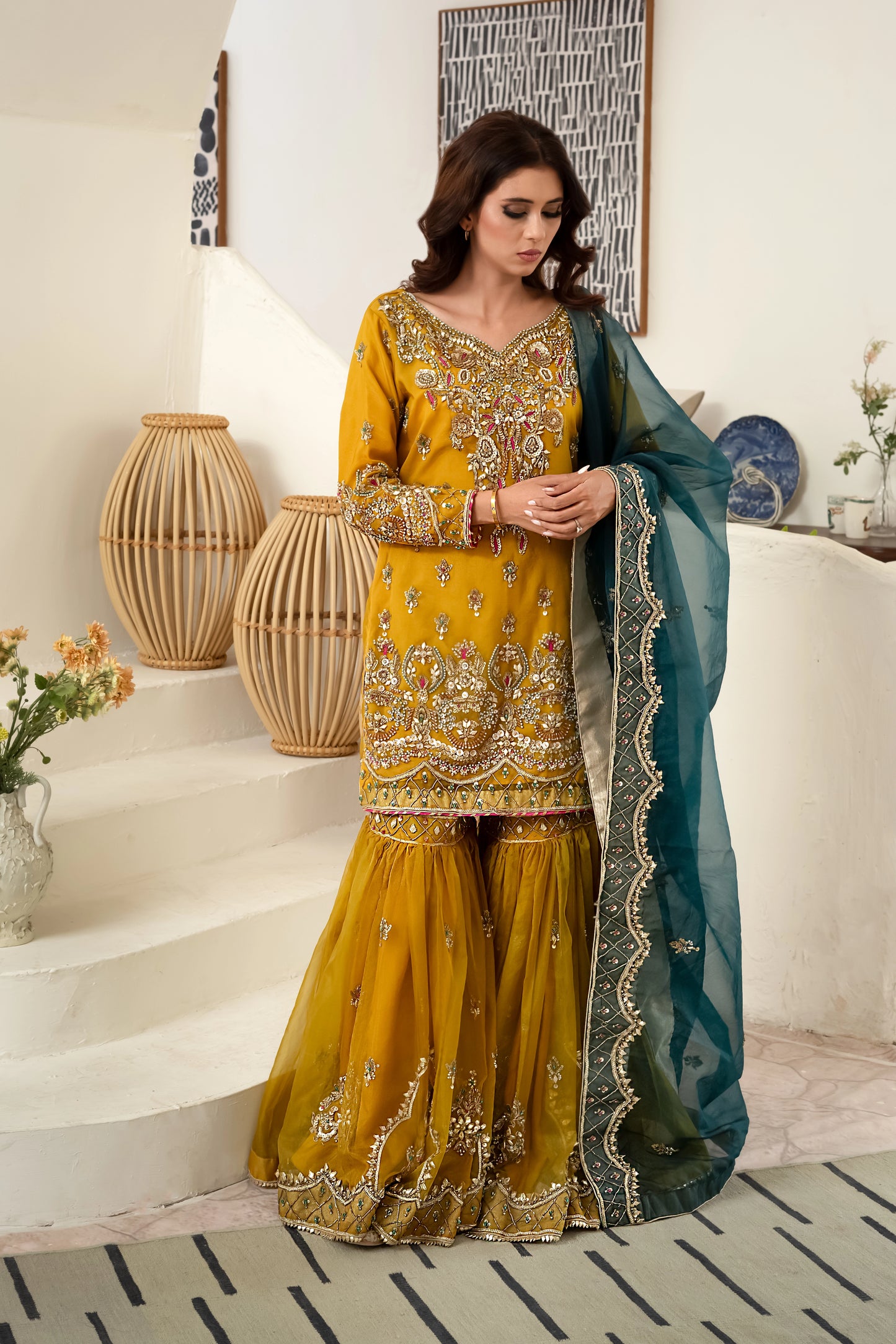 Yellow and zinc gharara wedding outfit with intricate zari and gotta work
