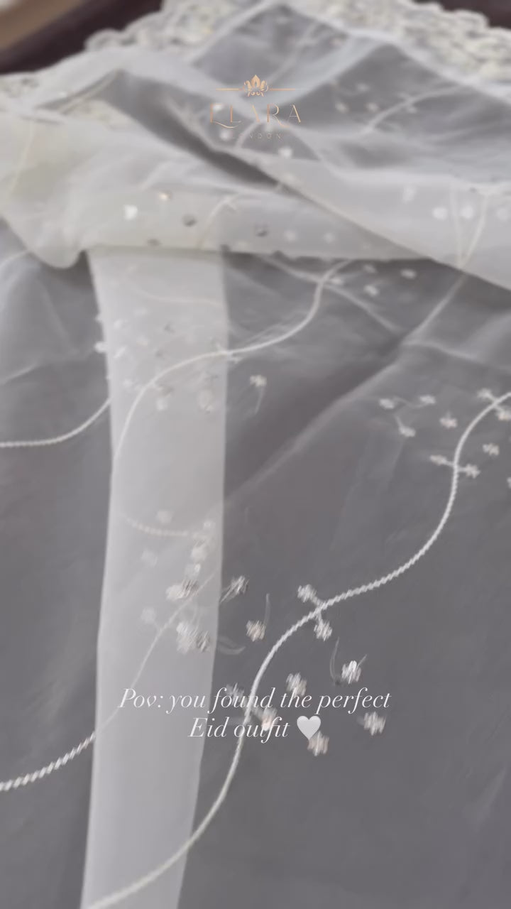 White organza embroidered outfit with delicate embroidery and handcrafted stonework