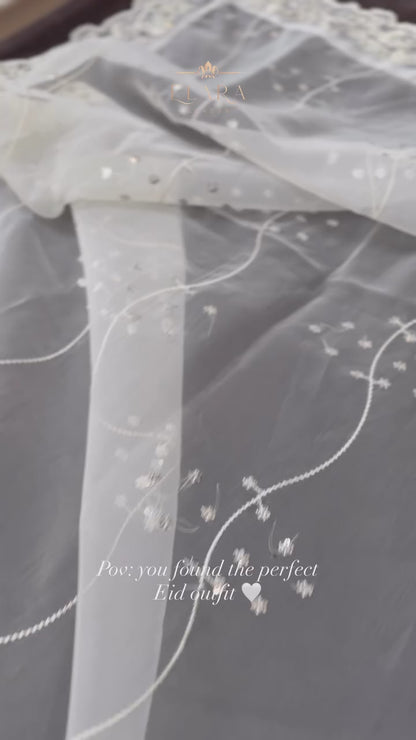 White organza embroidered outfit with delicate embroidery and handcrafted stonework