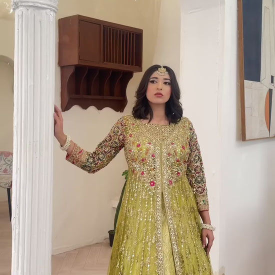 Soft green wedding lehenga choli with net gown and shimmering zari work