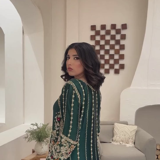 Silk emerald green zari wedding outfit with hand-made zari work on tussar silk