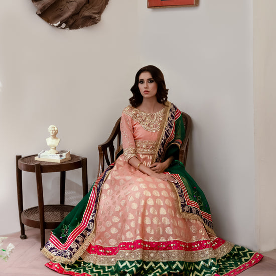 Soft peach lehenga choli wedding outfit with gota work and hand-painted dupatta