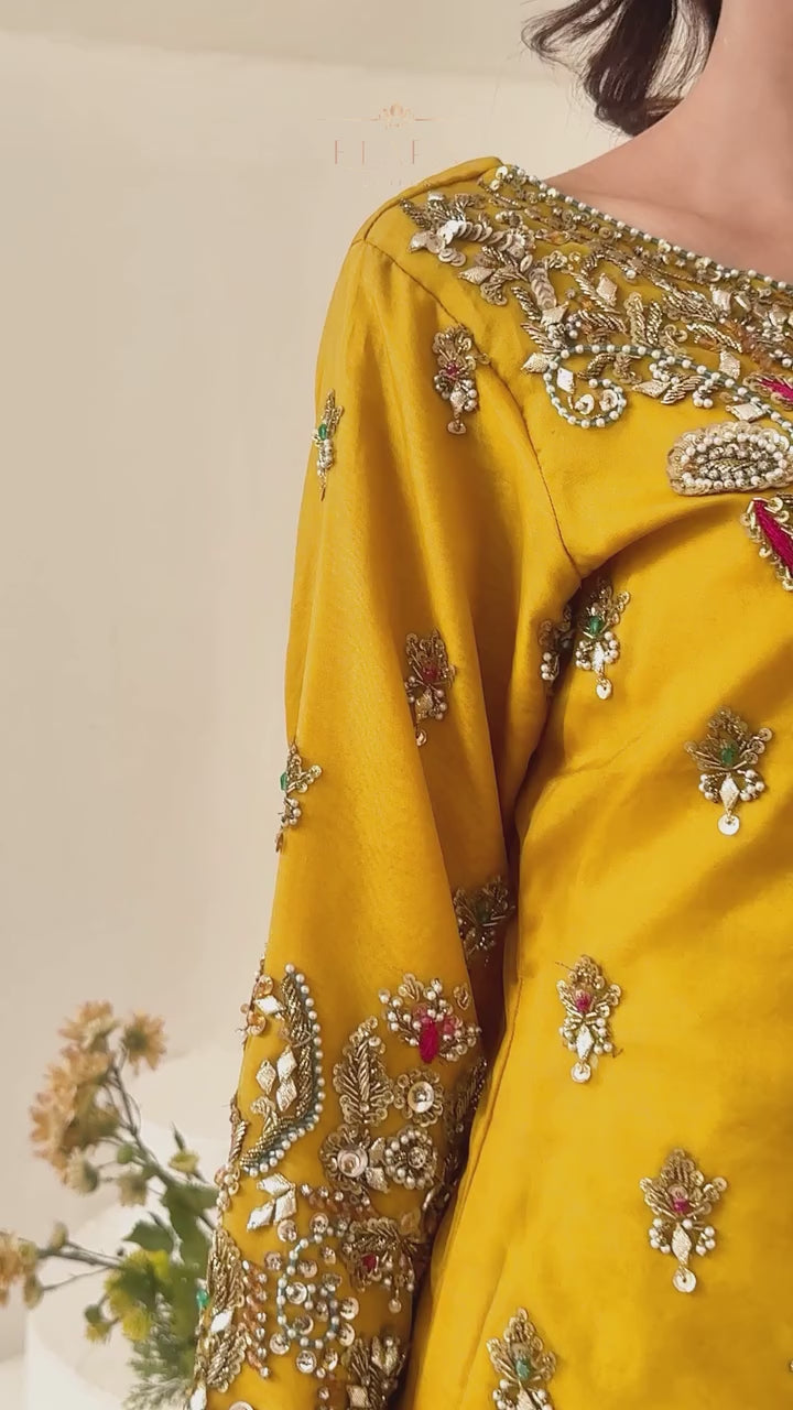 Yellow and zinc gharara wedding outfit with intricate zari and gotta work